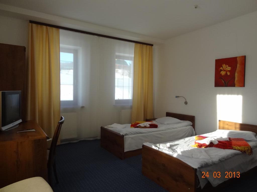 Hotel Alpenhof Pansion Slavske Pokoj fotografie